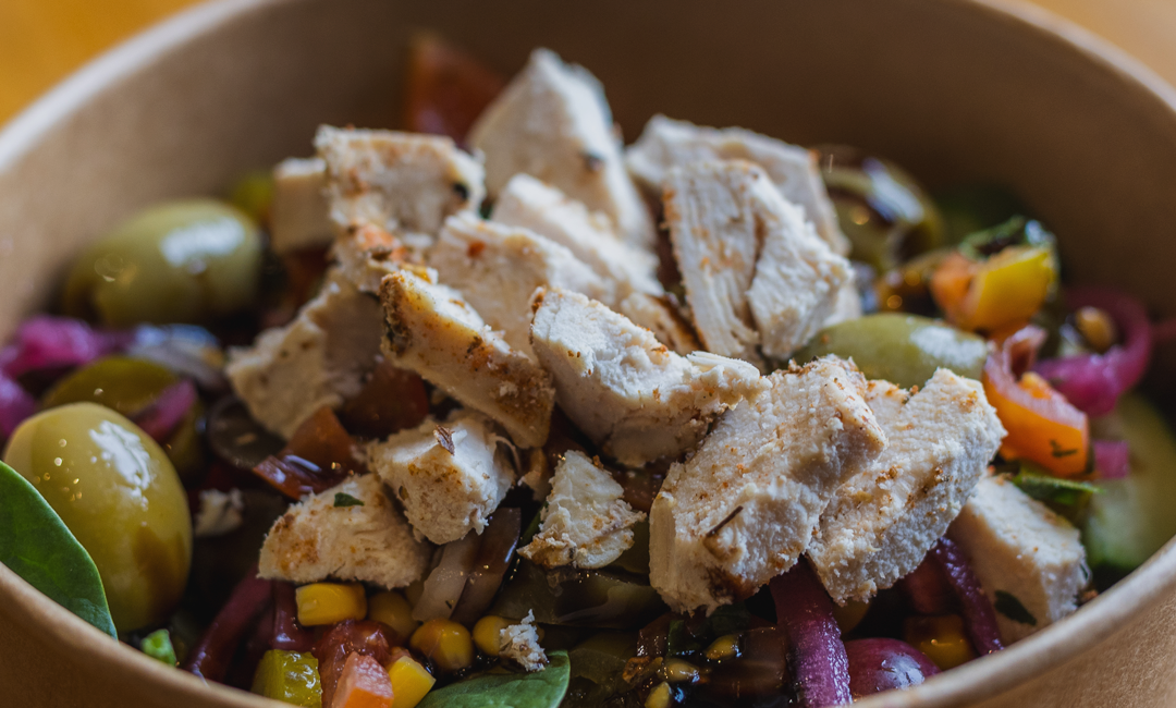 Image of a salad bowl to convey lunch