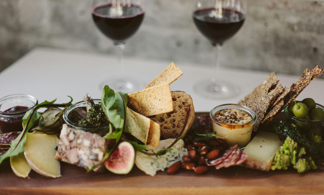 Image of charcuterie board and wine