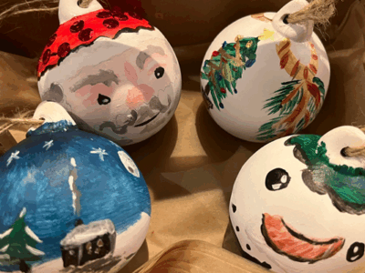 Image of four ceramic hand painted christmas baubles